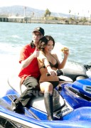 9e24f5130015778 Olivia Munn rides a Jet Ski in a Bikini